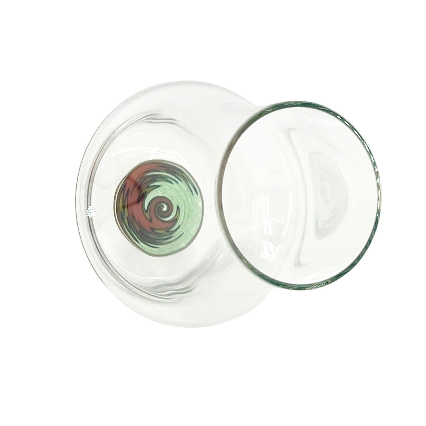 Clear handblown glass cup with an orange & green wig wag design on the base