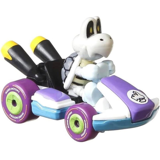 A die-cast toy model of Mario Kart's Dry Bones Standard Kart, predominantly purple with black and yellow details, on a white background.