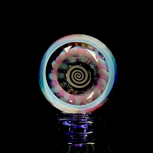 A multicolored glass marble with a swirl pattern, approximately 38mm in diameter.