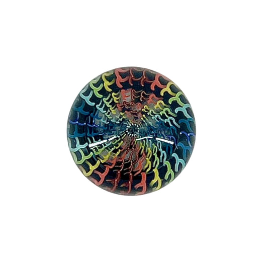 Multicolored glass marble on a white background