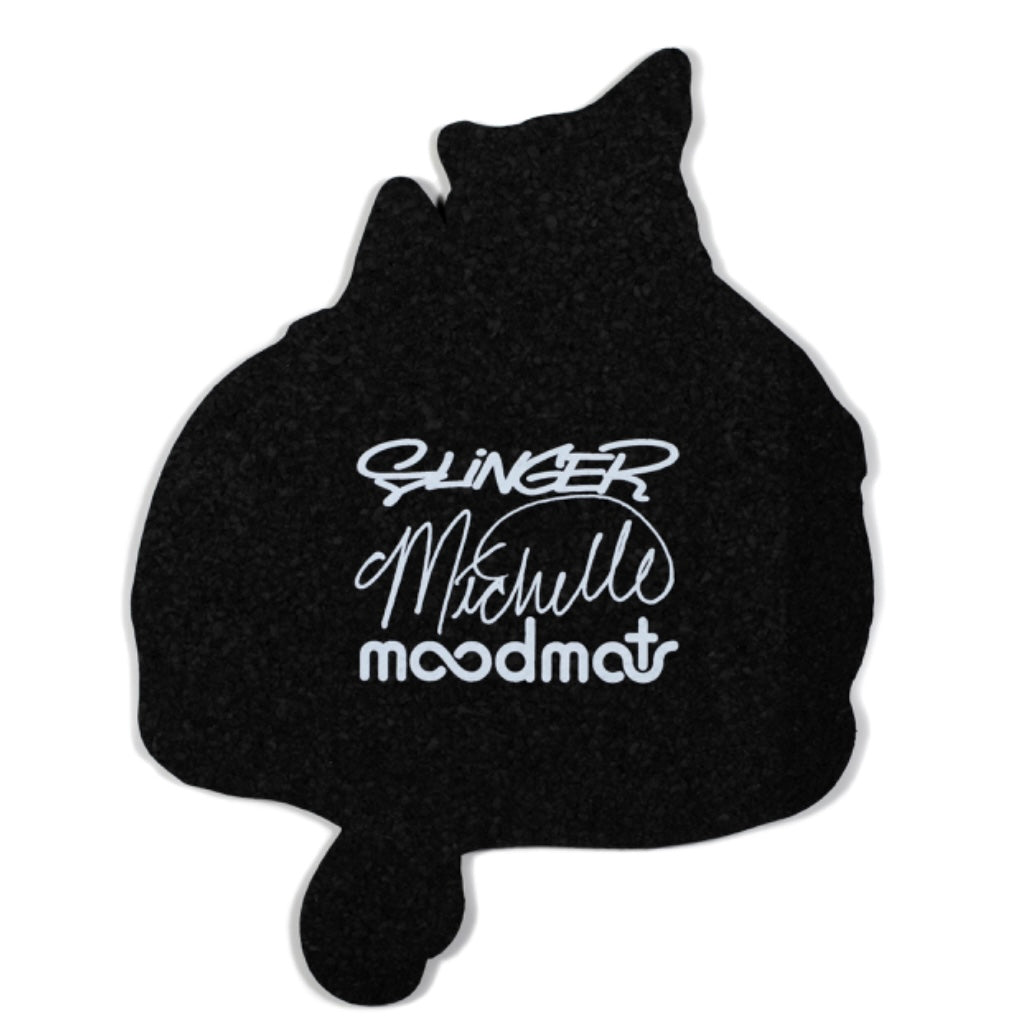 A decorative moodmat featuring a design with two cartoon cats and a colorful object.