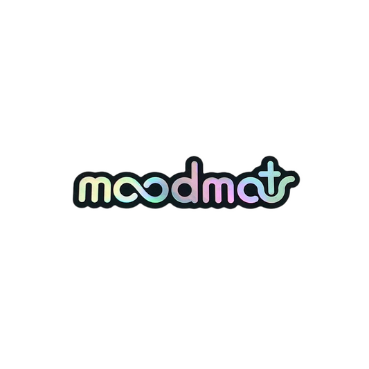 Colorful 'moodmat' sticker on a white background.
