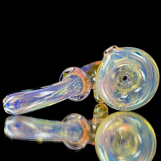 A colorful glass pipe with a double layer fume effect, featuring a small-pack bowl and a signed bottom.
