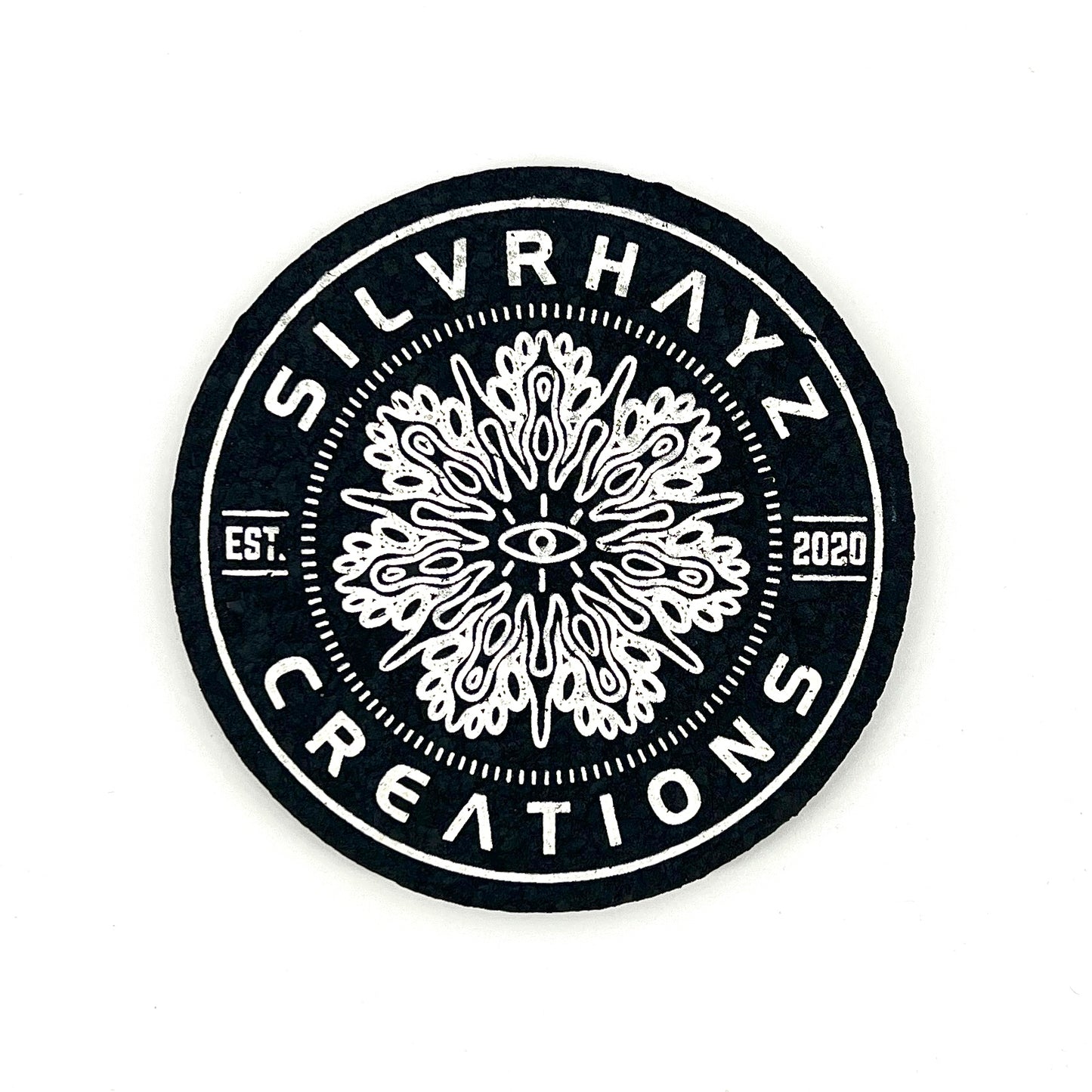 Black and white logo of Silvrhayz Creations with intricate design and text on a white background.