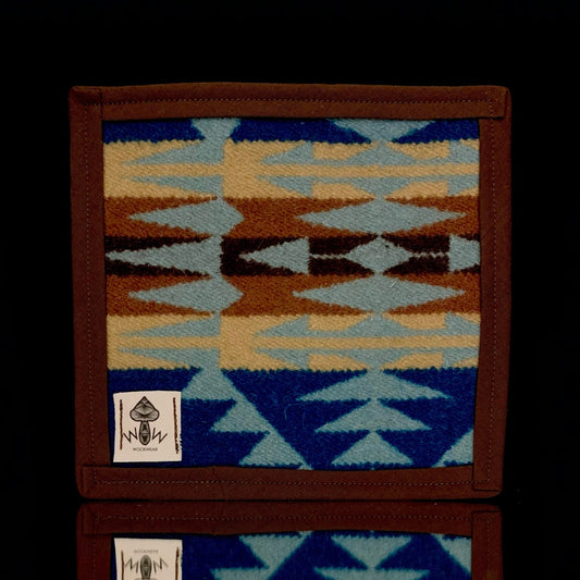A 6" x 6" rectangular Pendleton mat with a geometric pattern in blue, brown, and beige, featuring the Pendleton logo.