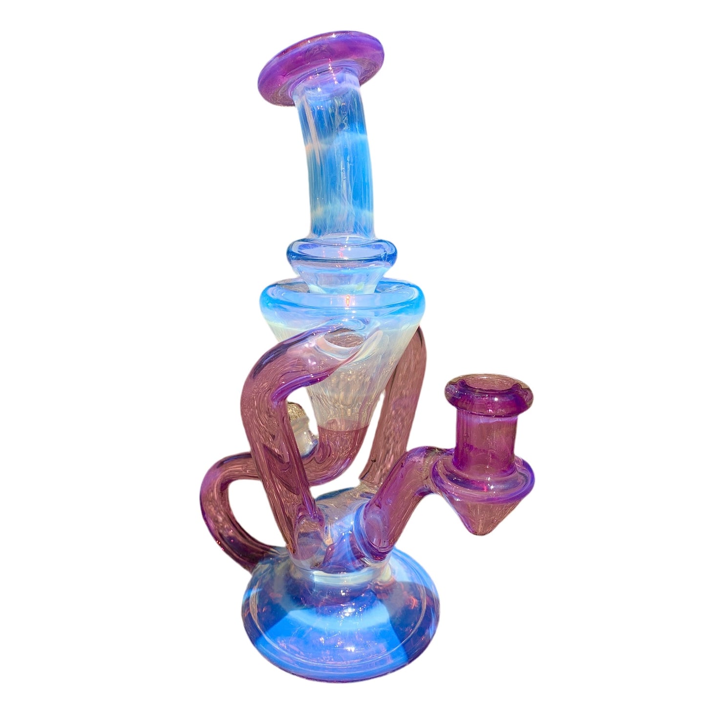 A colorful glass mini recycler with a bubble cap, featuring blue and purple swirls and a pink opal coin inside the bubble cap.