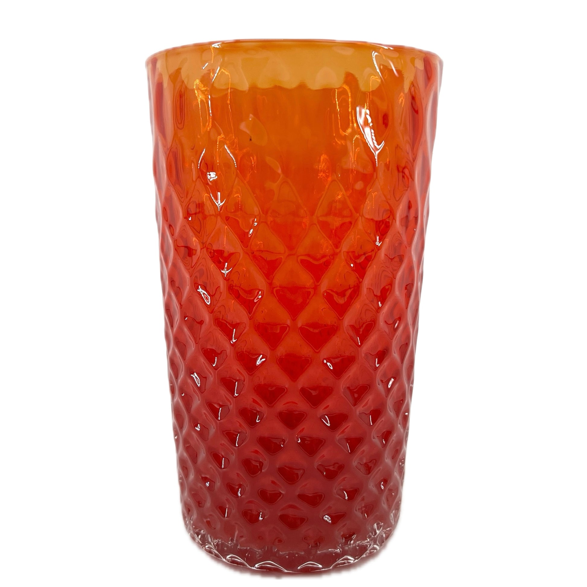 A red glass with a geometric optic pattern.