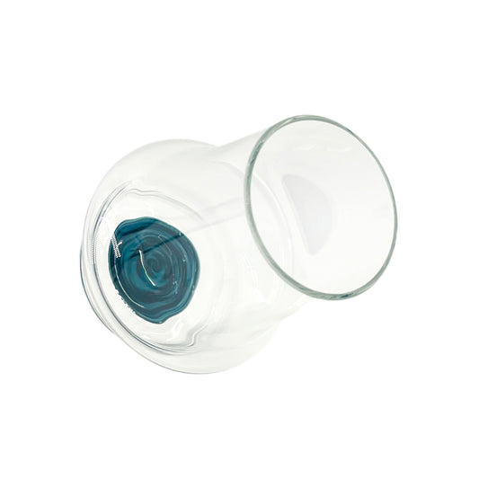 Clear handblown glass cup with a blue wig wag design on the base