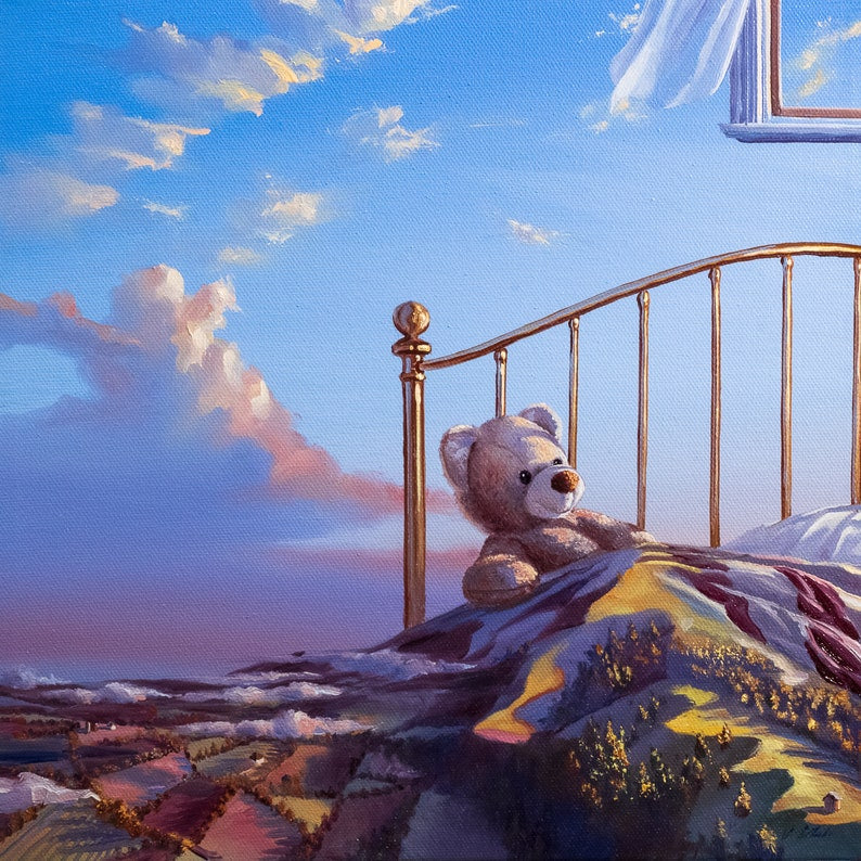 A whimsical artwork print featuring a teddy bear sitting on a bed with a landscape quilt, under a cloudy sky.