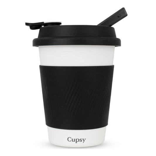 Black and white reusable coffee cup with a straw lid on a white background.