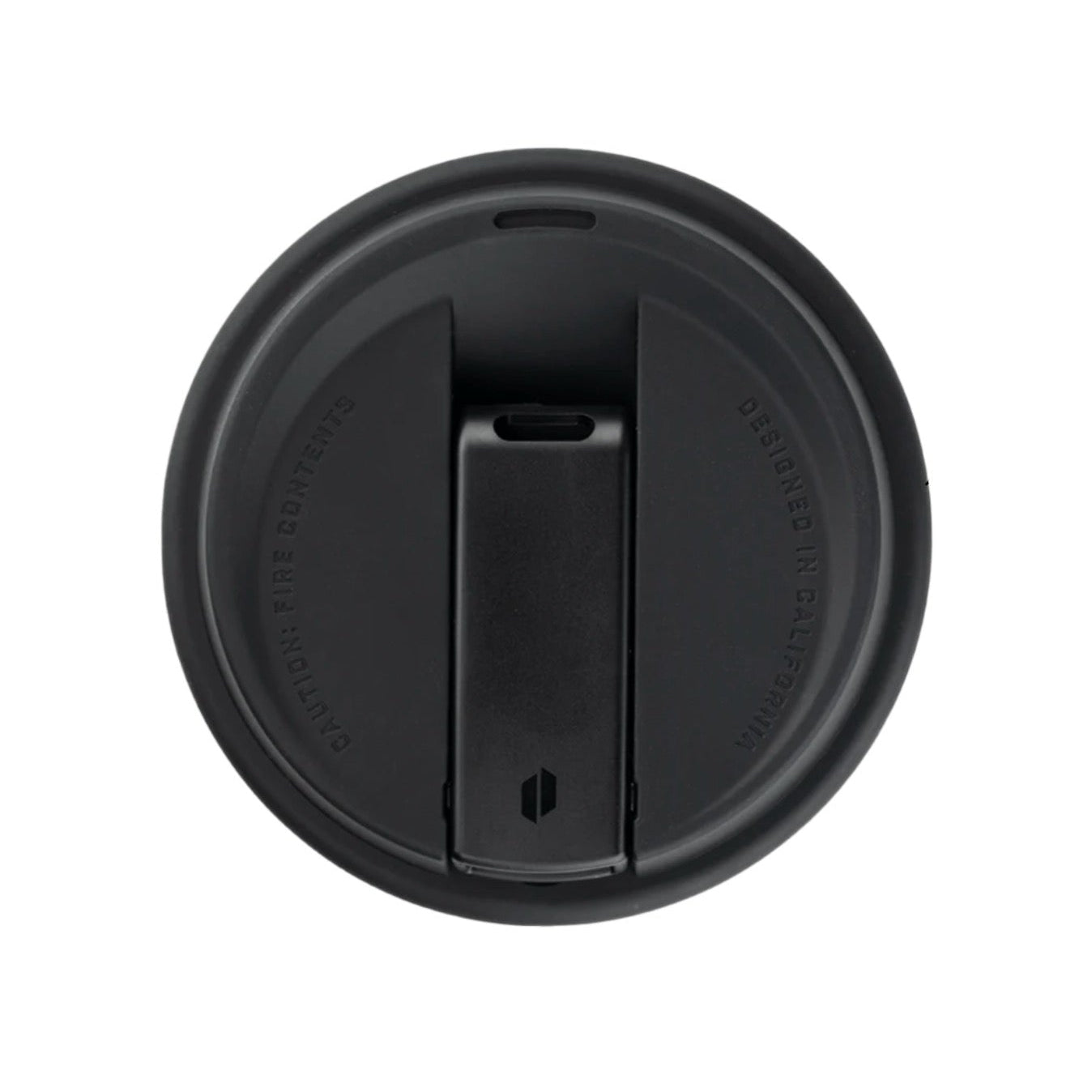 Black circular object with a central slit on a white background.