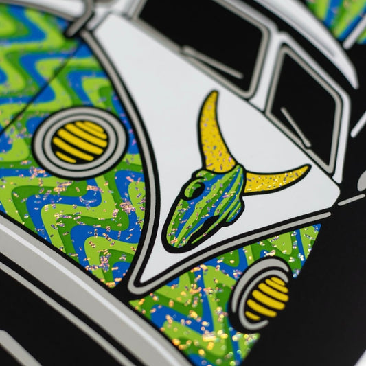 Decorative badge with a van and abstract design on a colorful background