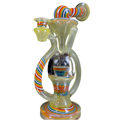 A multicolored, hand-blown glass piece with a percolator and a small bowl attachment, featuring vibrant, swirling colors on a clear glass background.