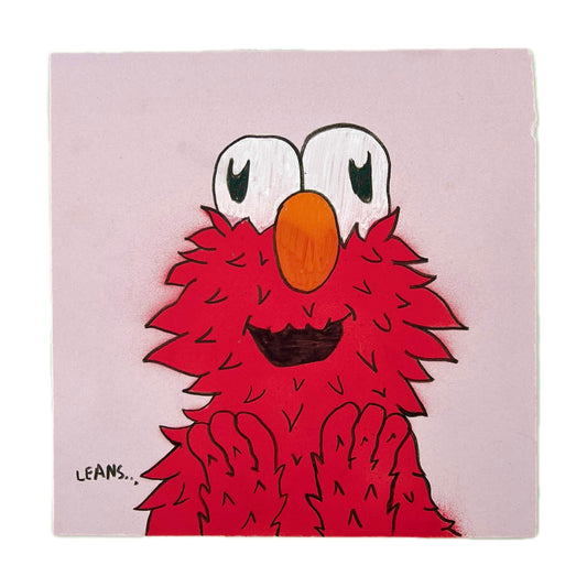 Hand-drawn red character 'Elmoh' on a pink background.