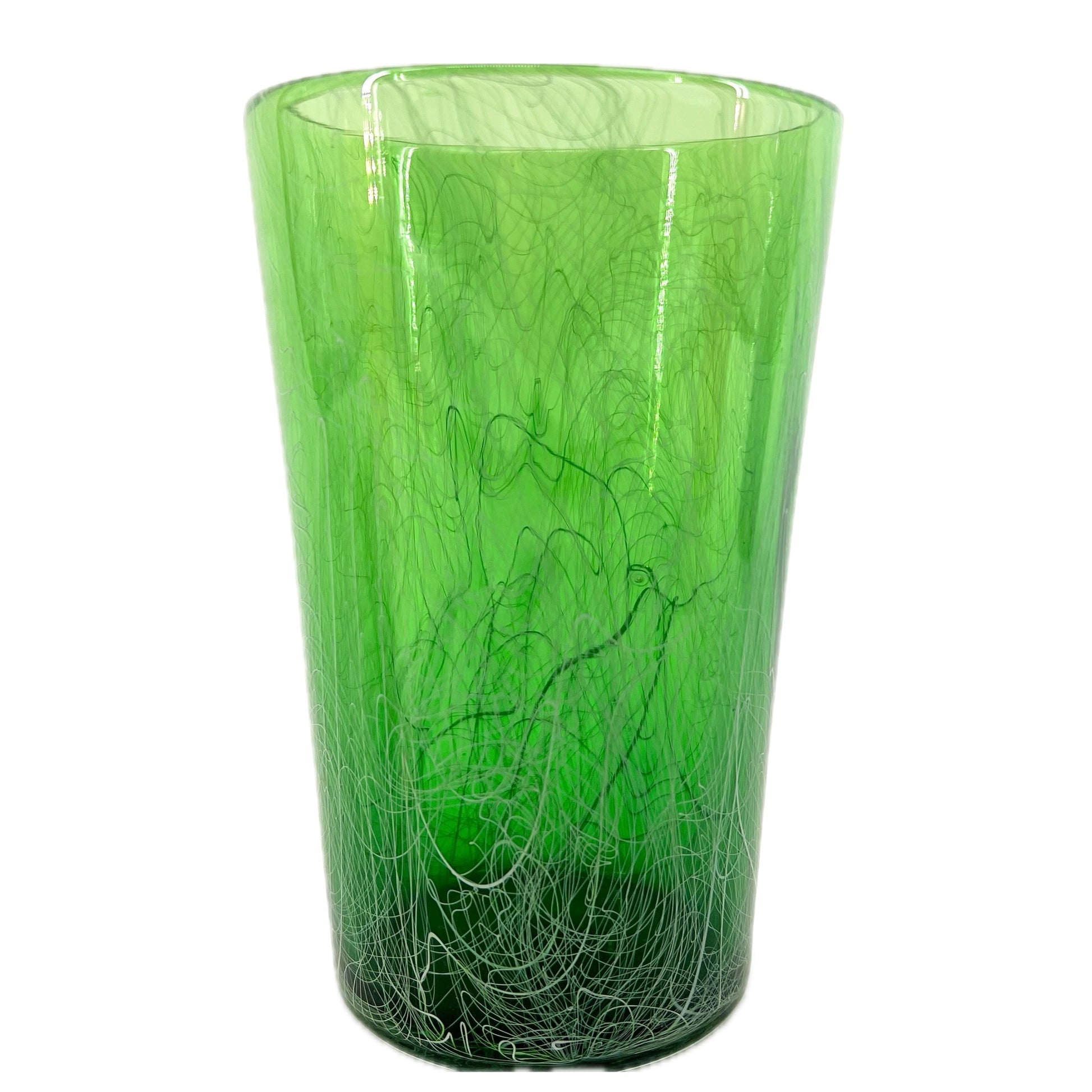 A green glass pint with unique patterns and a semi-transparent appearance.