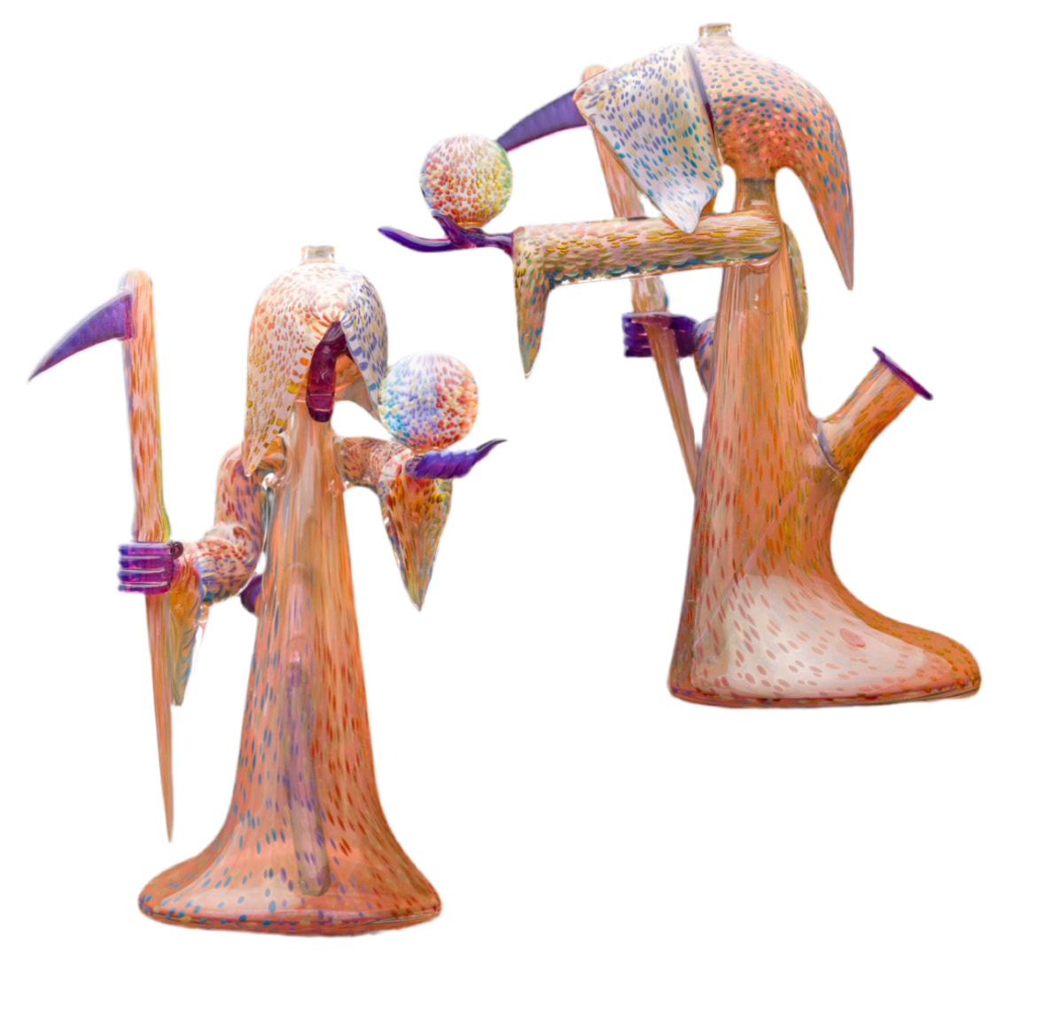 Decorative glass sculpture of a reaper holding a scythe and crystal ball.