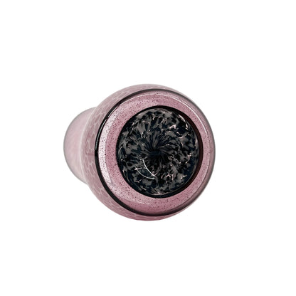 Pink glass object with black base on a white background.