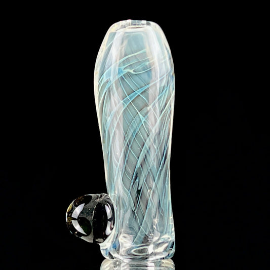 A glass fume tip with swirls of color, primarily clear with blue patterns, designed for use with larger rolls.