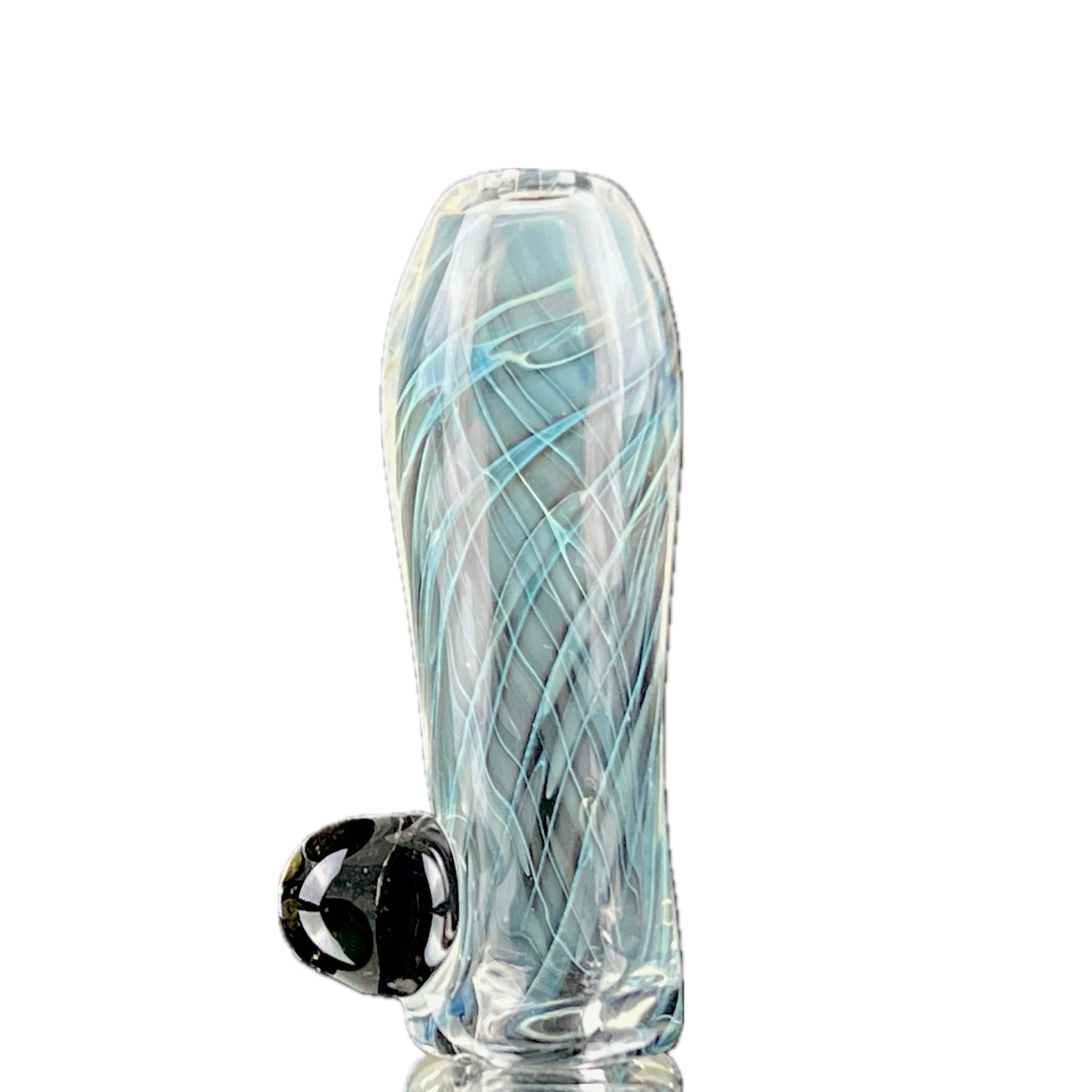 A glass piece with a swirl pattern, predominantly light blue, with a black bowl attached to the side.