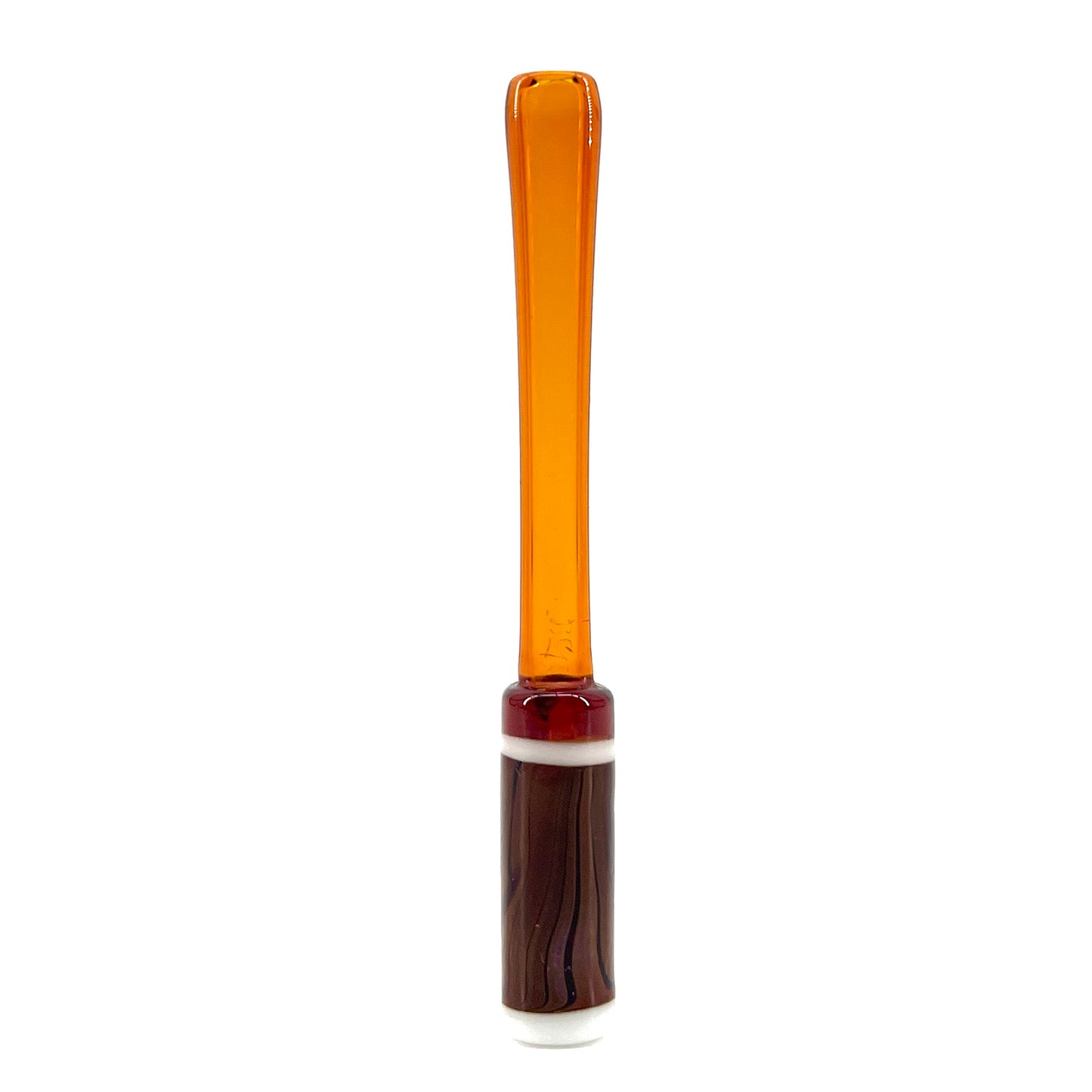 Glass sculpture with amber top and brown base on a white background