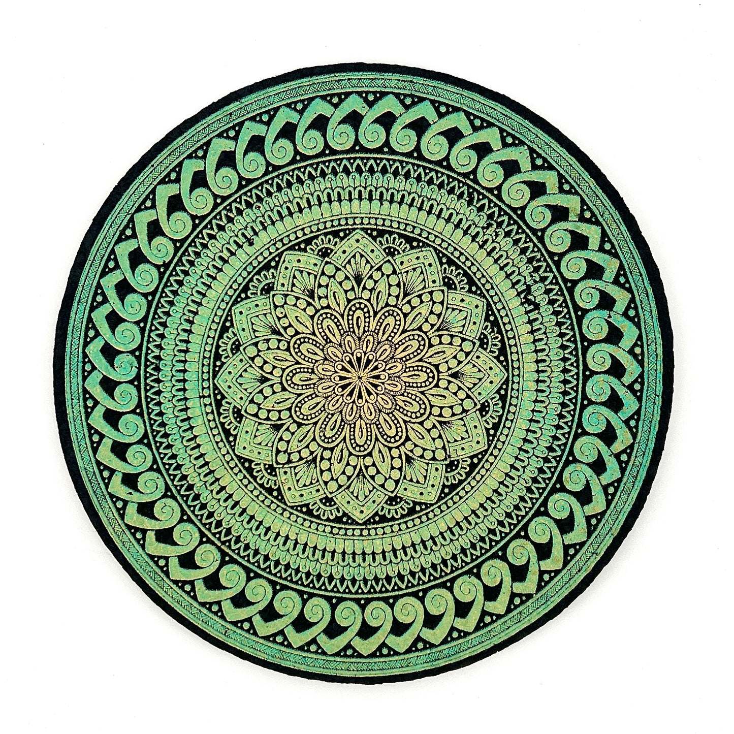 Green and black mandala design on a white background.