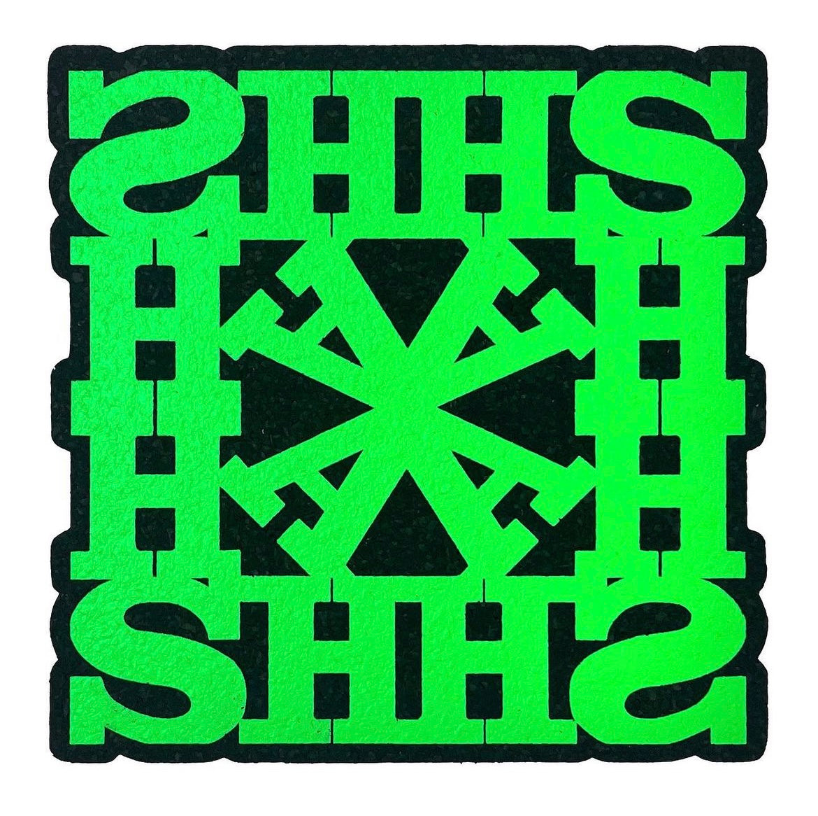 A green square-shaped rug with a geometric pattern and the text 'HASH' repeated across the design.
