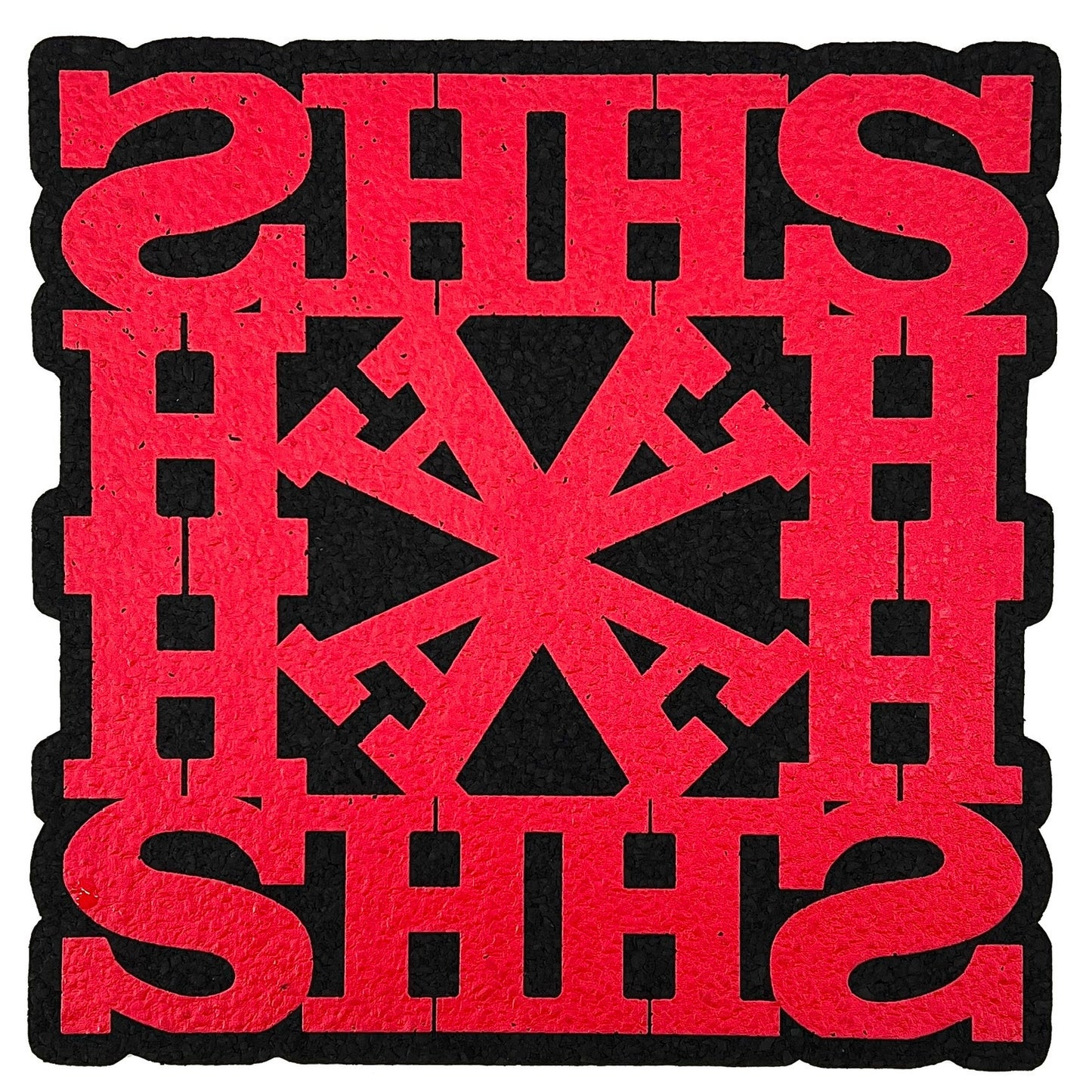 A square red and black moodmat with the text 'HASH' designed by Lot Comedy, featuring a geometric pattern.