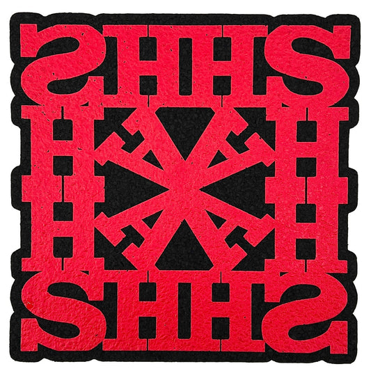 A square red and black moodmat with the text 'HASH' designed by Lot Comedy, featuring a geometric pattern.