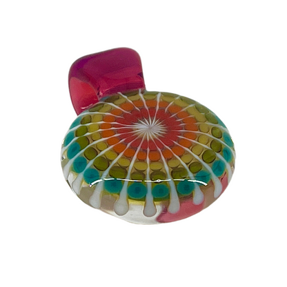 Colorful glass pendant with a white star-like center on a white background.