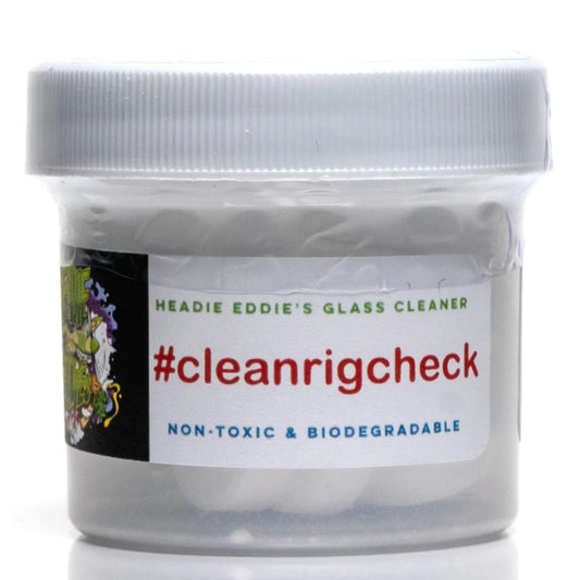 A clear plastic jar with a white lid labeled 'Headie Eddie's Glass Cleaner', featuring the hashtags '#cleanrigcheck', 'non-toxic', and 'biodegradable'.