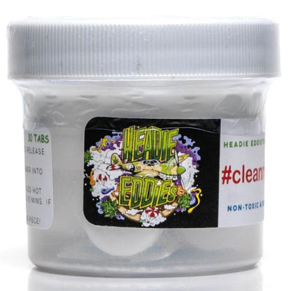 A clear plastic jar containing white cleaning tablets, labeled with 'Headie Eddie's' branding and the text '#clean, 30 tabs', against a white background.