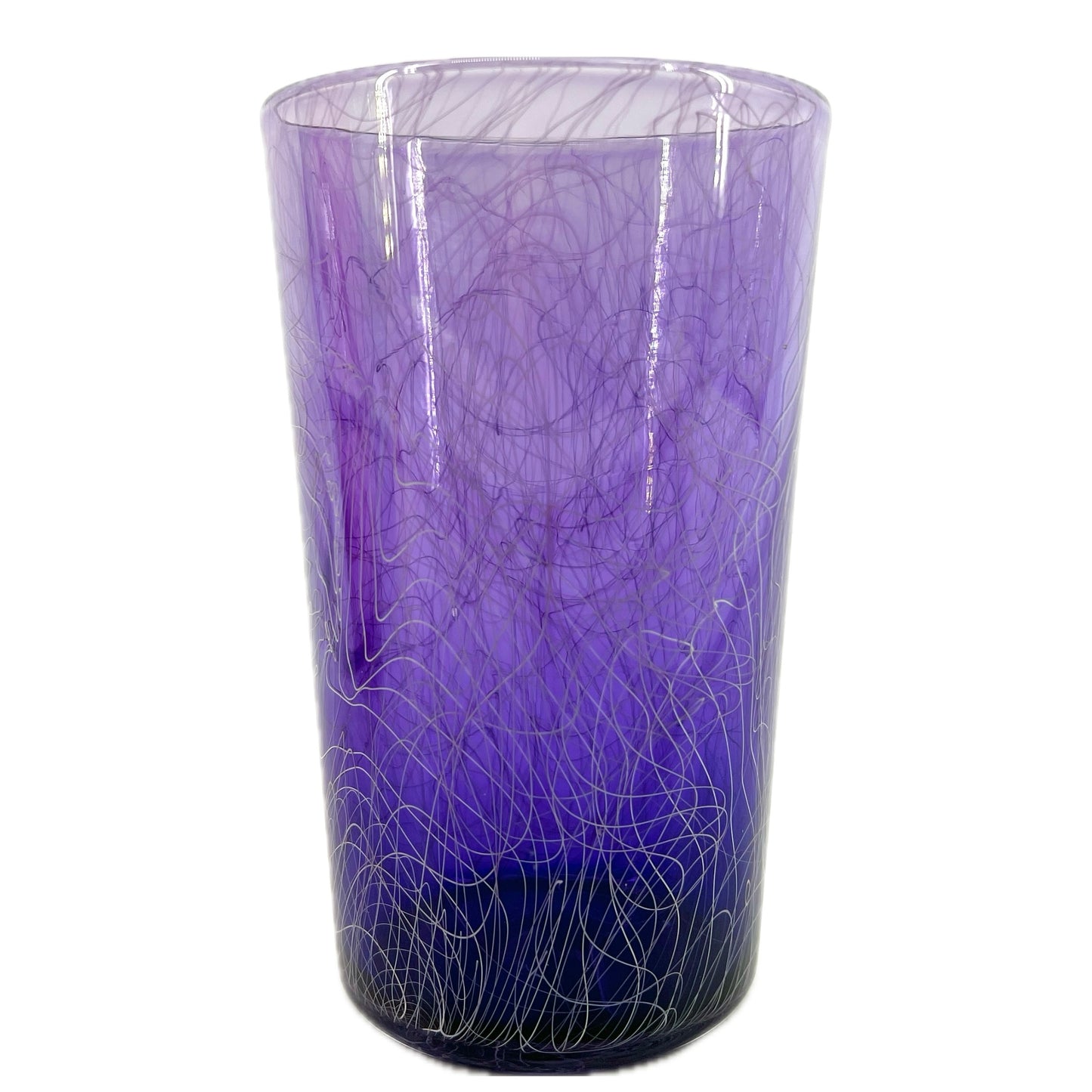 A purple glass with a swirling white pattern, crafted by Xander D’Ambrosio.