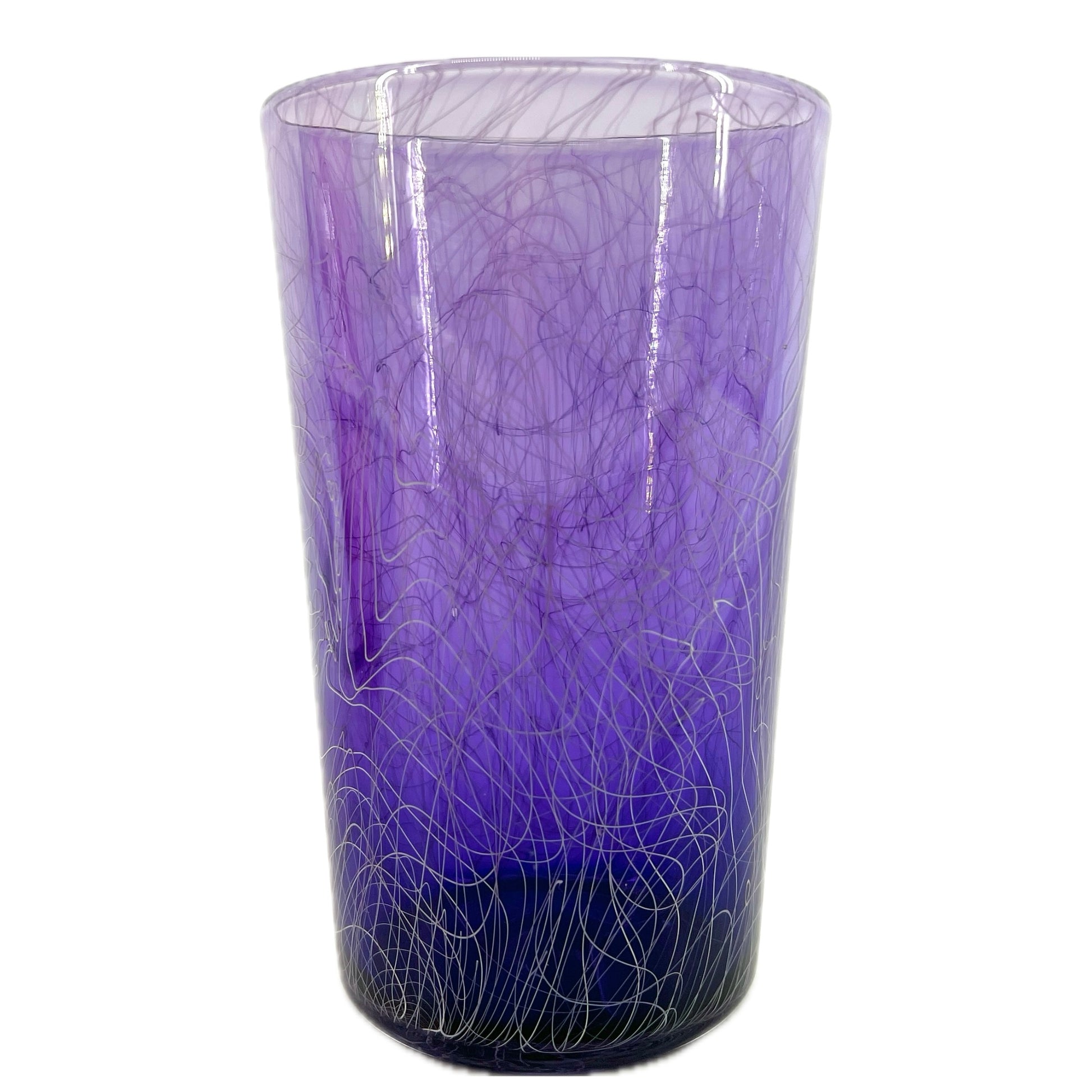 A purple glass with a swirling white pattern, crafted by Xander D’Ambrosio.