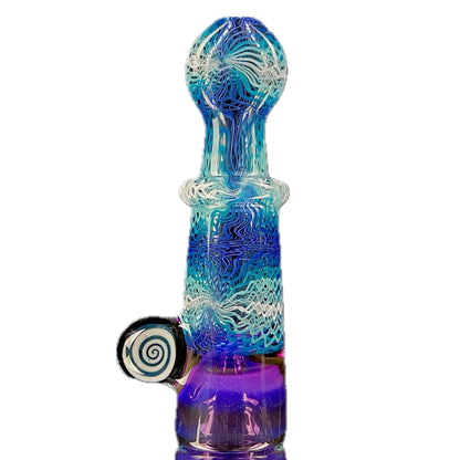 A colorful glass piece with blue and purple hues, featuring intricate patterns and a large-pack bowl.