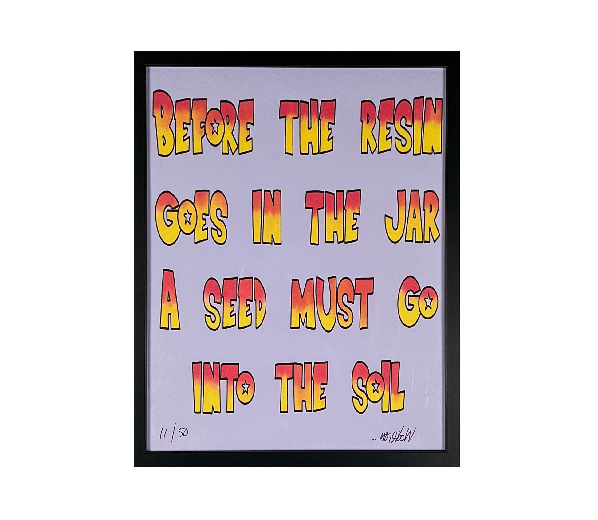 Framed artwork with colorful text on a light purple background.