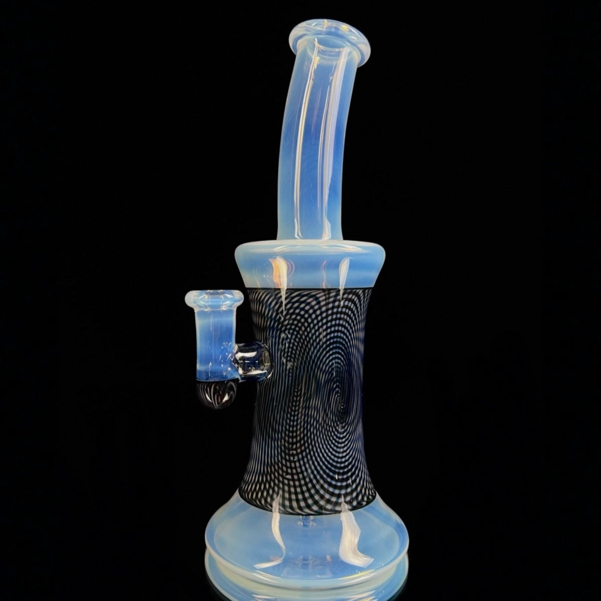 A Jared Wetmore crafted glass piece with 'Moonstone', 'Lucid', and 'Jet Black' Hypnotech sections, featuring a 4-hole circle perc.