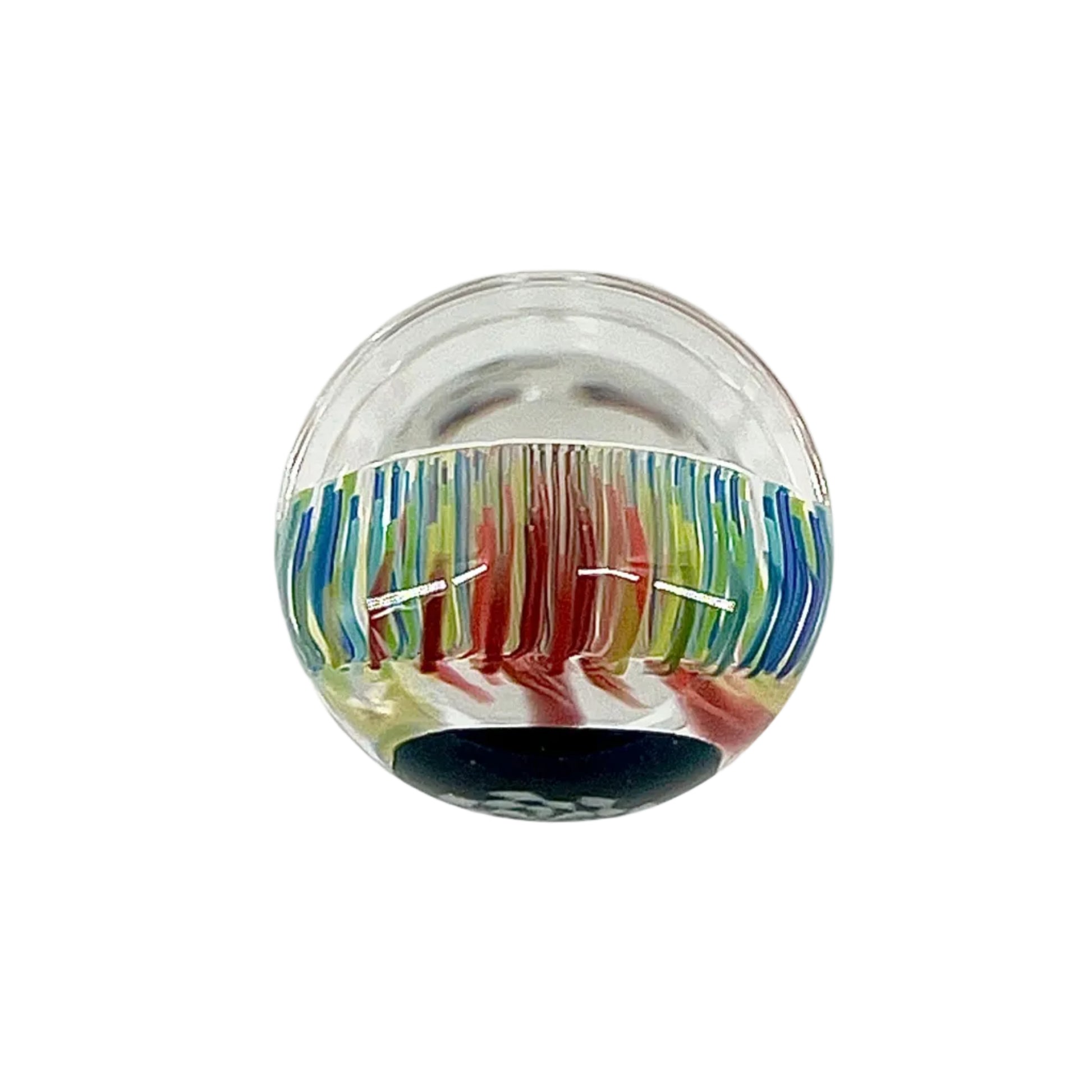 Colorful glass paperweight on a white background.