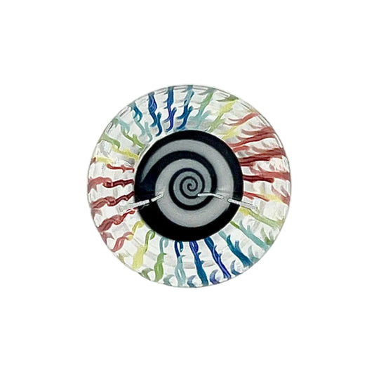 Round object with a multicolored spiral design on a white background.