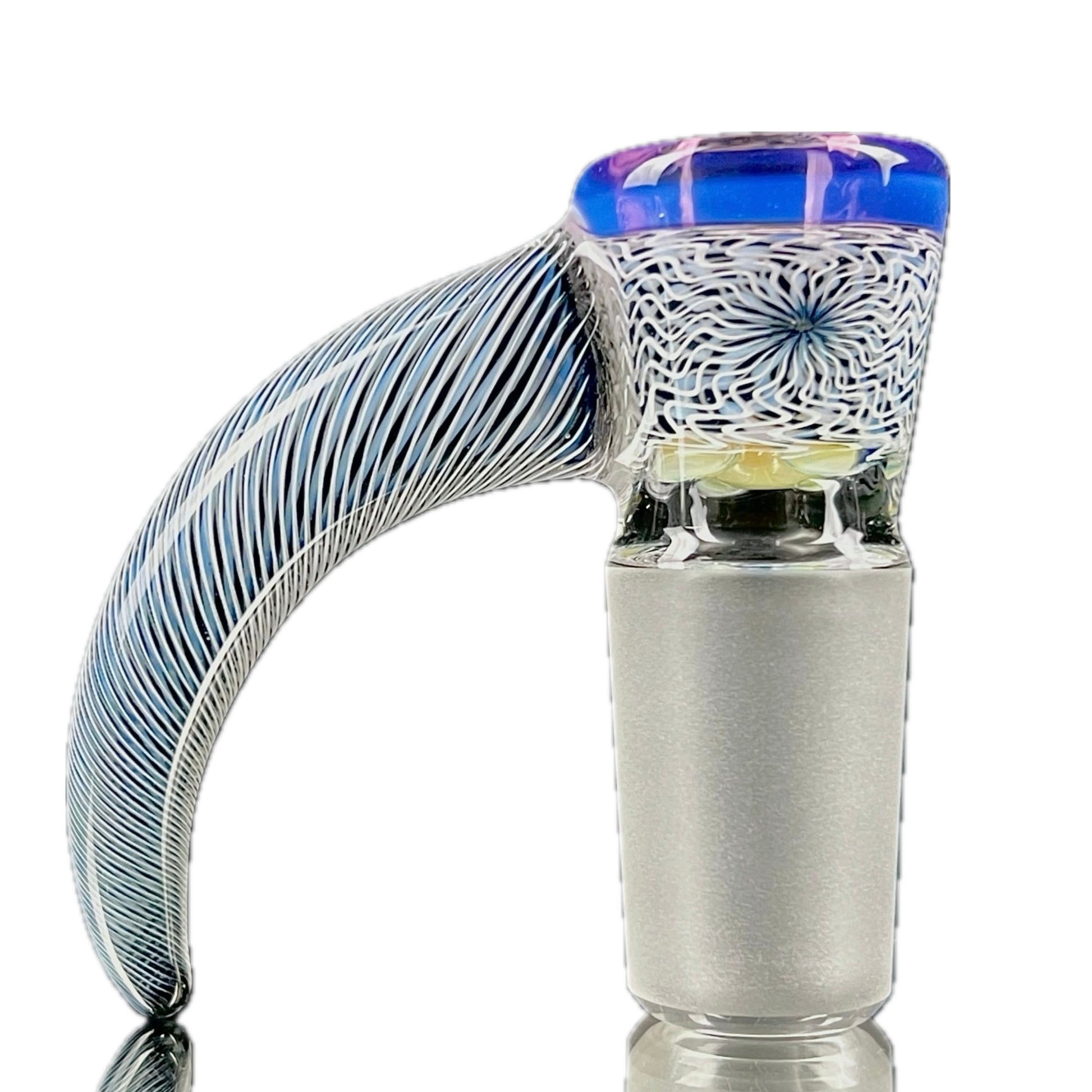 A glass slide with a blue and white patterned stem and a gold amethyst lip.