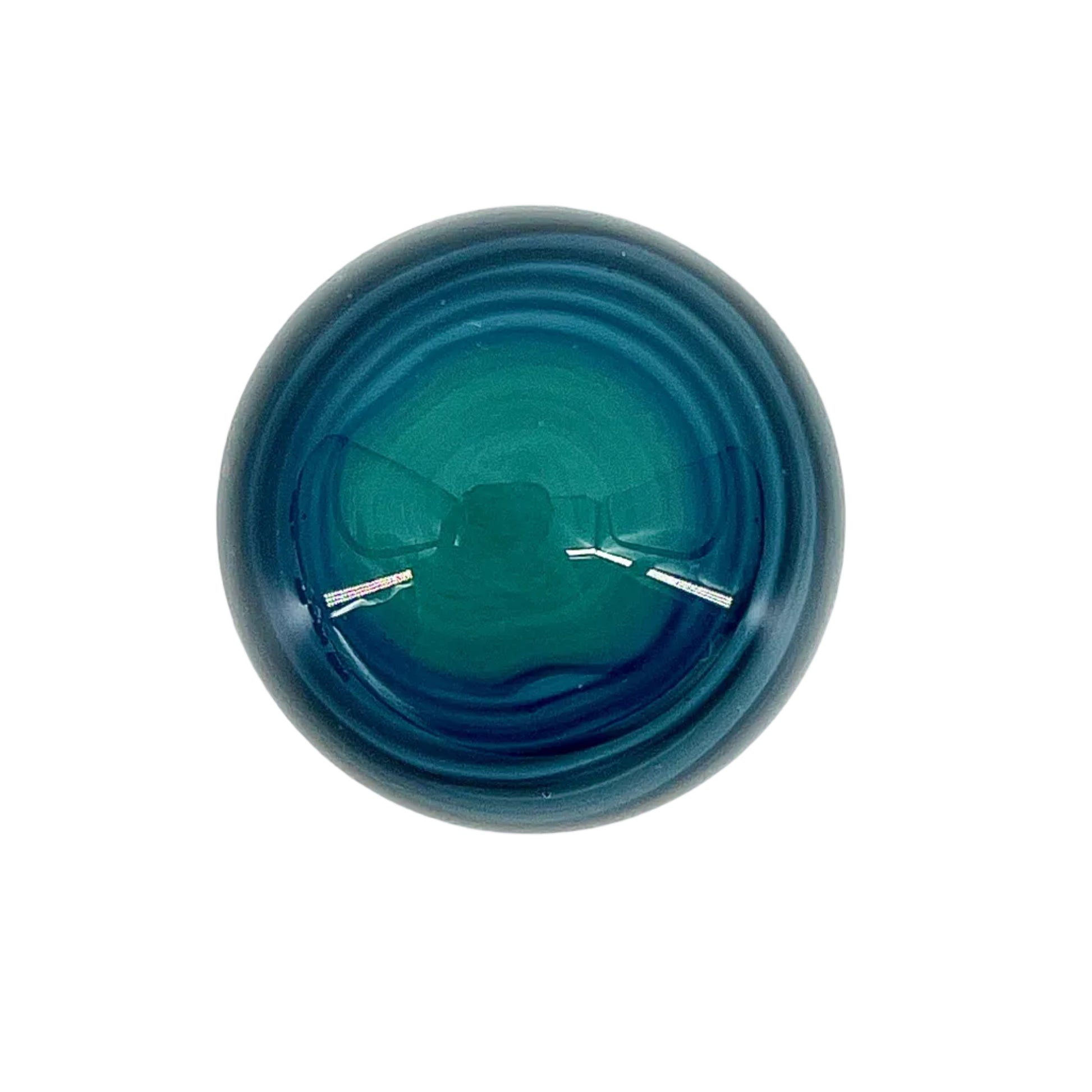 Blue glass marble on a white background.