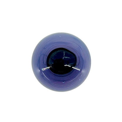 Purple glass object with a central dark area on a white background.