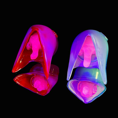 Two colorful glass pendants on a black background.