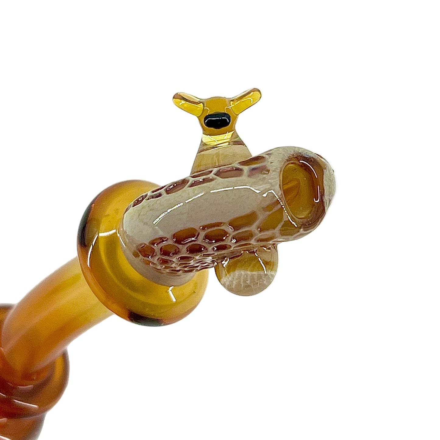 Glass pipe with honeycomb design on a white background.