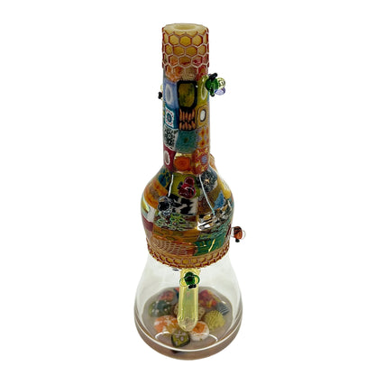 Colorful glass smoking accessory on a white background.