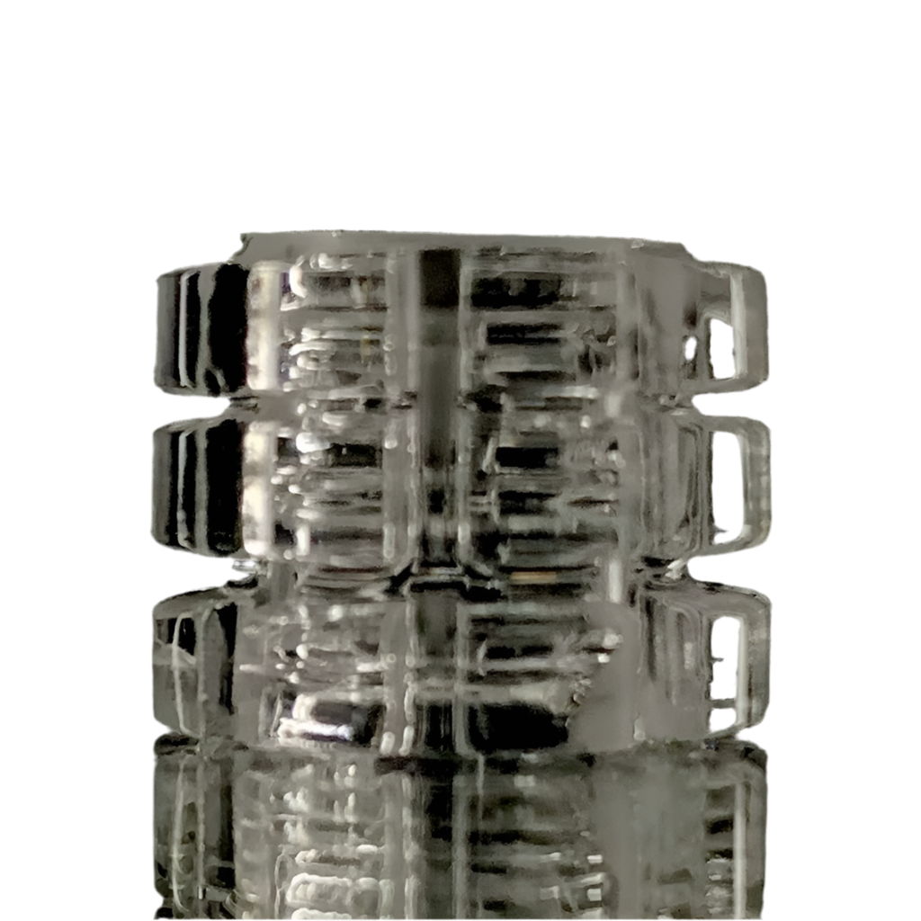A clear quartz gear insert with multiple ridges, designed for use with a quartz banger to enhance heat retention.