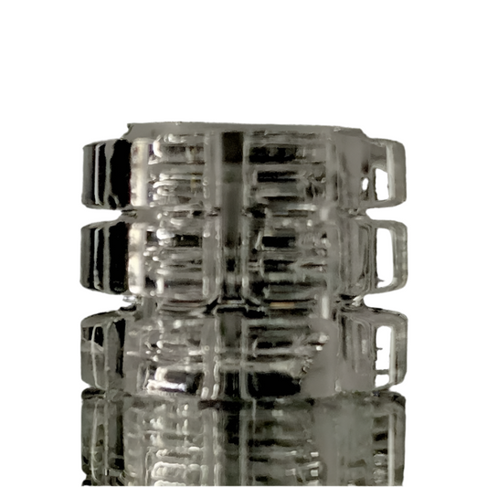 A clear quartz gear insert with multiple ridges, designed for use with a quartz banger to enhance heat retention.