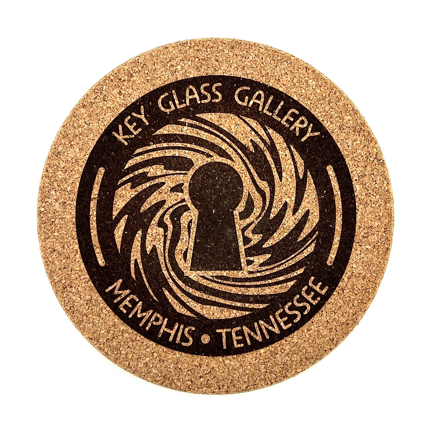 A round cork mat with 'KEY GLASS GALLERY MEMPHIS TENNESSEE' printed in a spiral design.
