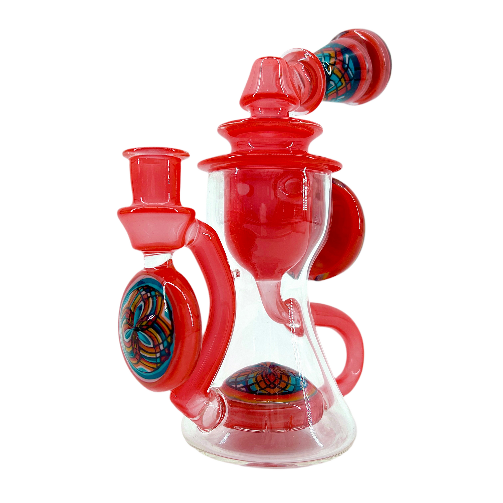 Red and clear glass smoking device with colorful designs on a white background.