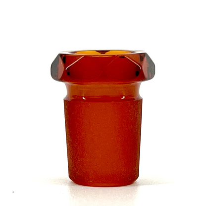 A red, faceted glass reducer with a tapered design, featuring a smaller diameter at the top and a larger diameter at the bottom, against a white background.