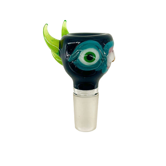 Sculpted glass slide with eye design on a white background.